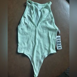 Urban Outfitters Brand New with tag! Stretchy light green body suit. Size XS/S